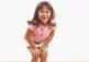 Child with their hands on their knees
